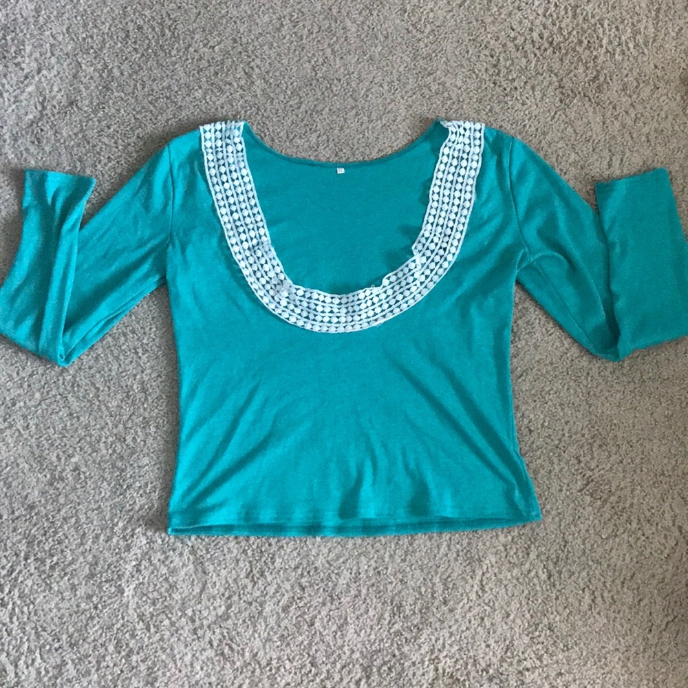 FOR SALE-NWOT- short/low cut, teal blouse